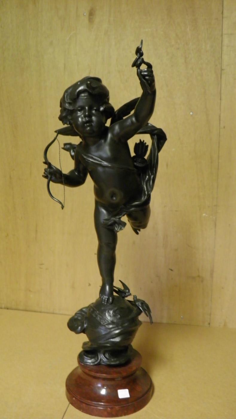 Bronze cupid on marble base